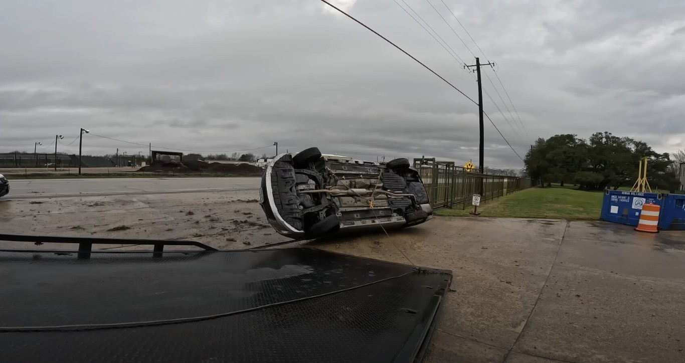 Accident recovery and winching service recovering overturned vehicle in Beavercreek, OH